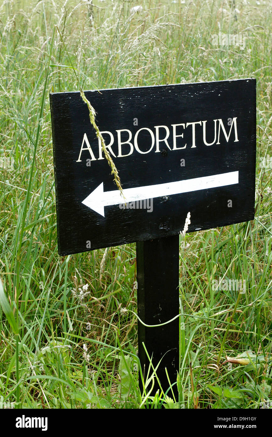 A sign showing the way to an Arboretum. Stock Photo