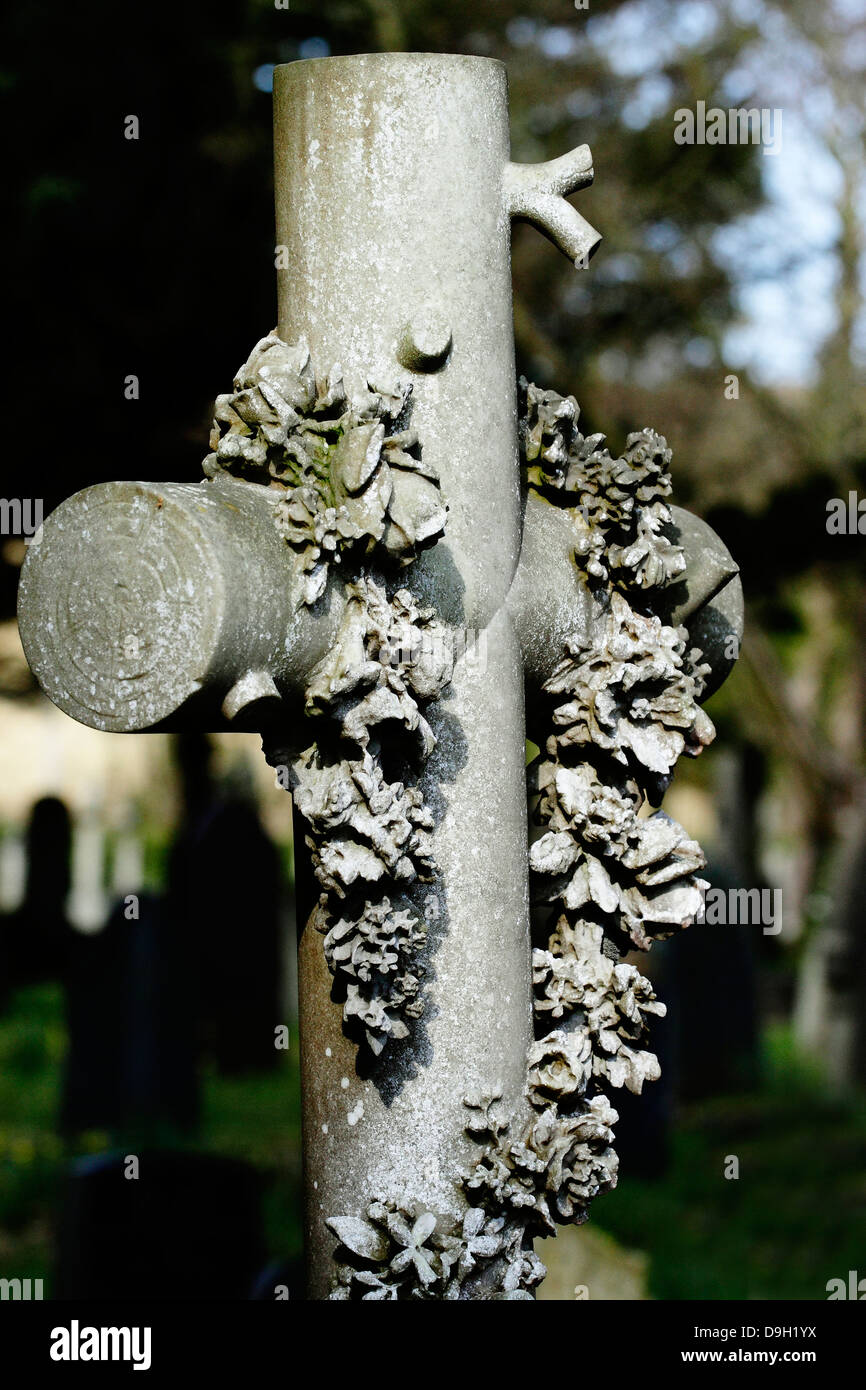 An ornate Grave Stone in the form of a Wreathed Cross. Stock Photo