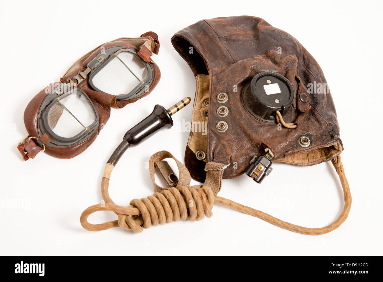 Flying equipment  worn by RAF pilots & air crew during WW2. The C-Type flying helmet with wiring loom &  MK Vlll flying goggles. Stock Photo