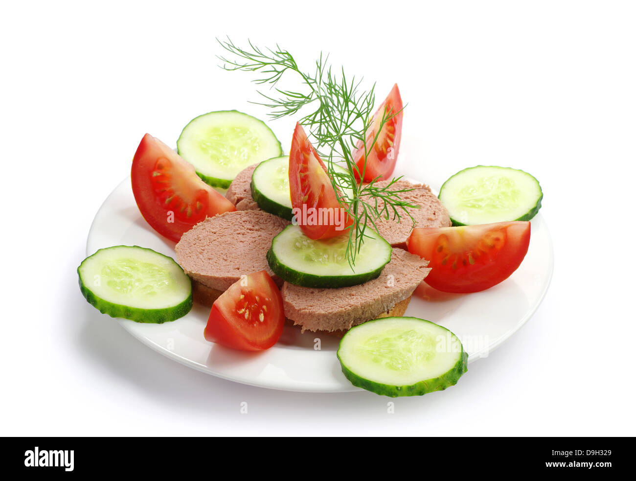 Sandwich with liverwurst, fresh cucumber and tomato on white Stock