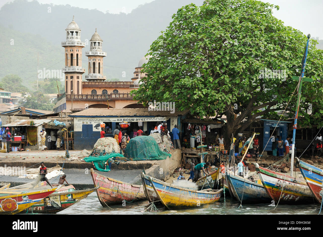 SIERRA LEONE, fishing harbor in Tombo or Tumbu, food security and the livelihood of small scale coast fisherman are affected by big trawler fleet, mosque Masjid Baitullah Stock Photo