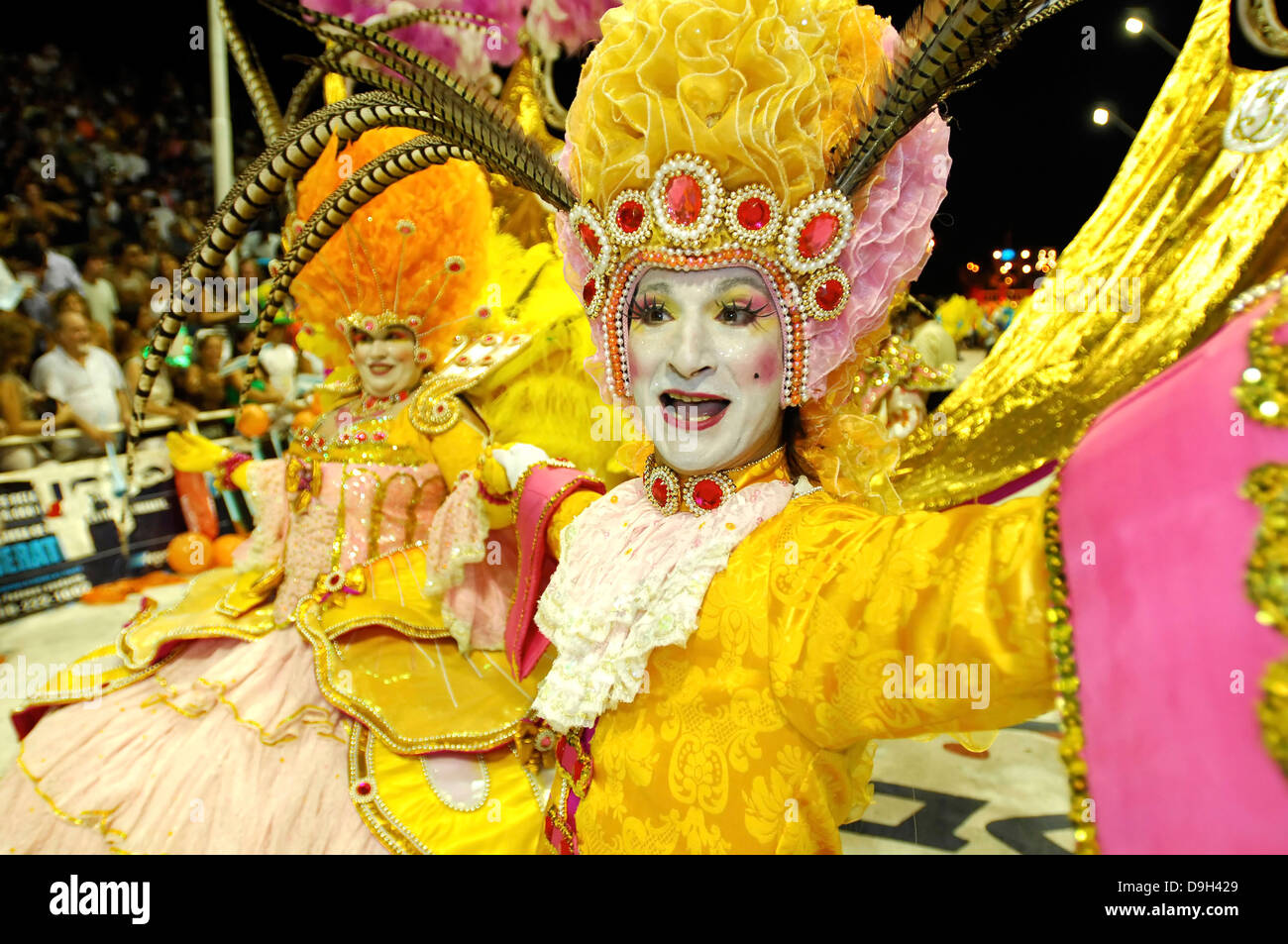 Carnival in Argentina. Members of one group of carnival dance and