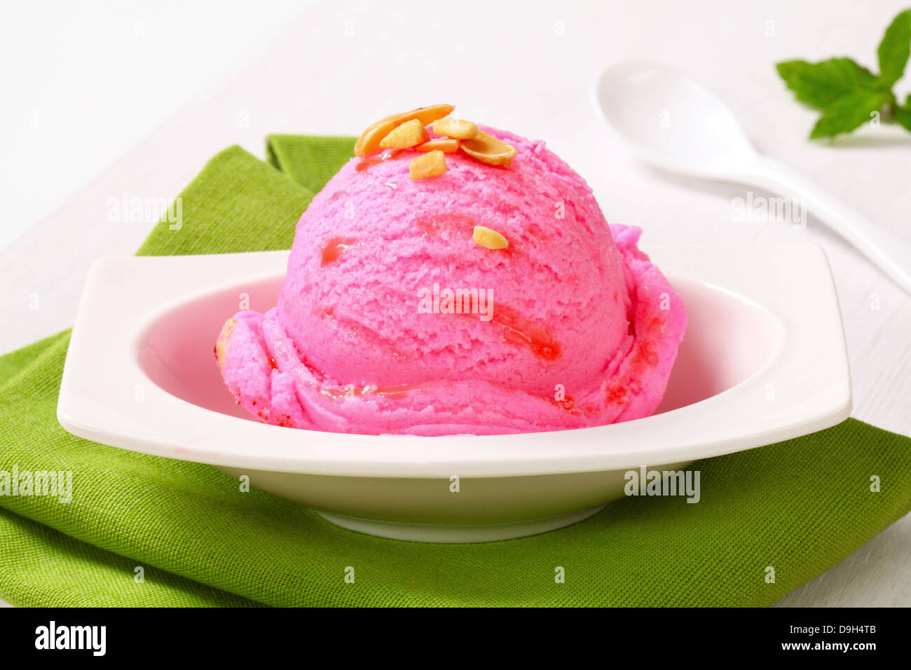 Scoop of pink ice cream in a dessert bowl Stock Photo