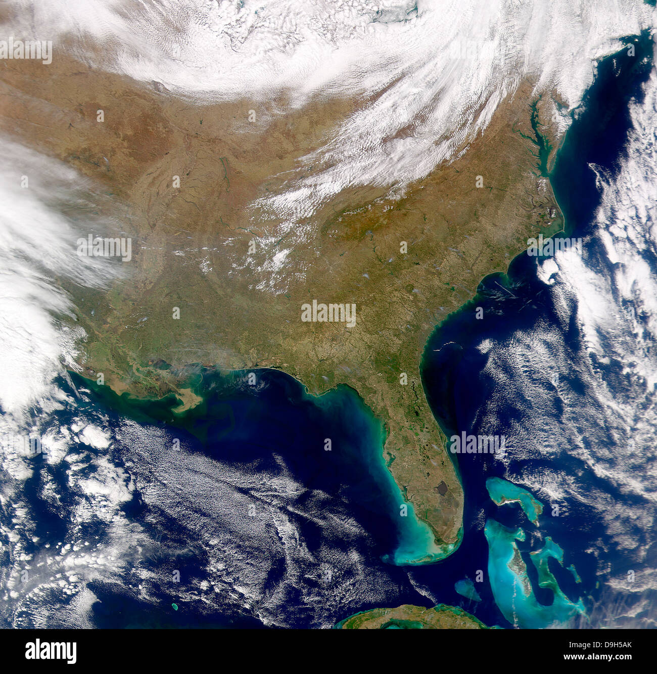 Satellite view of the southeastern United States. Smoke plumes are visible amongst the cloud-free skies. Stock Photo