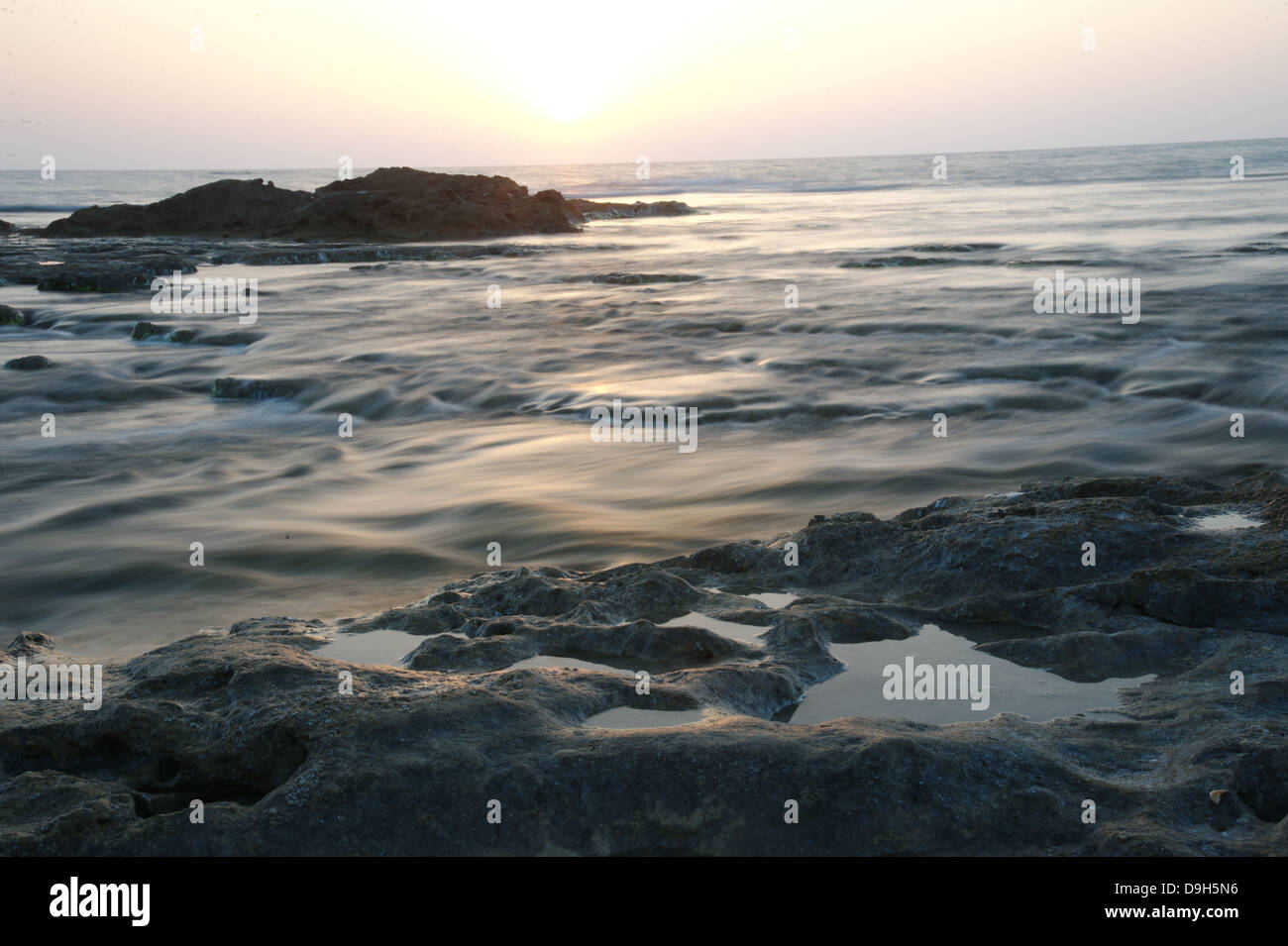 Intense colors sunset over sea, nature background Stock Photo - Alamy