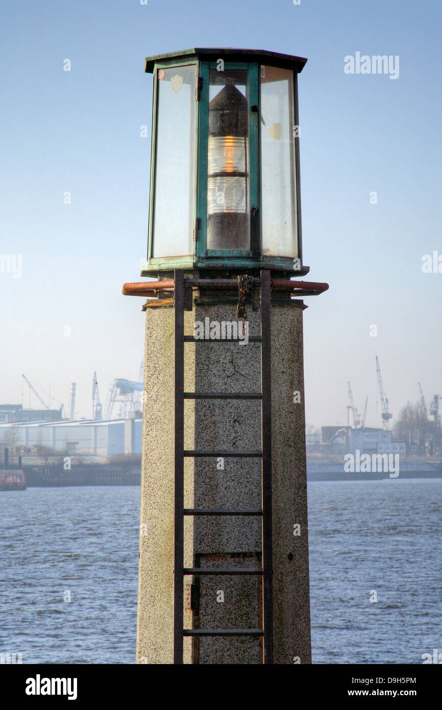 Old beacon in the Hamburg harbour (harbour city) Stock Photo