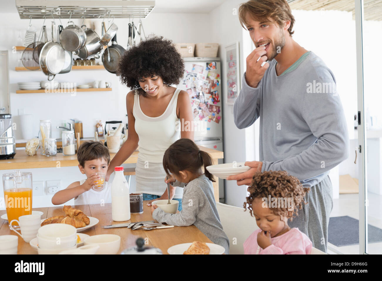Family at breakfast table Stock Photo - Alamy