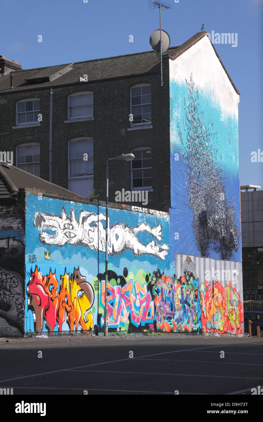 Graffiti on side of house near Brick Lane East End London Stock Photo