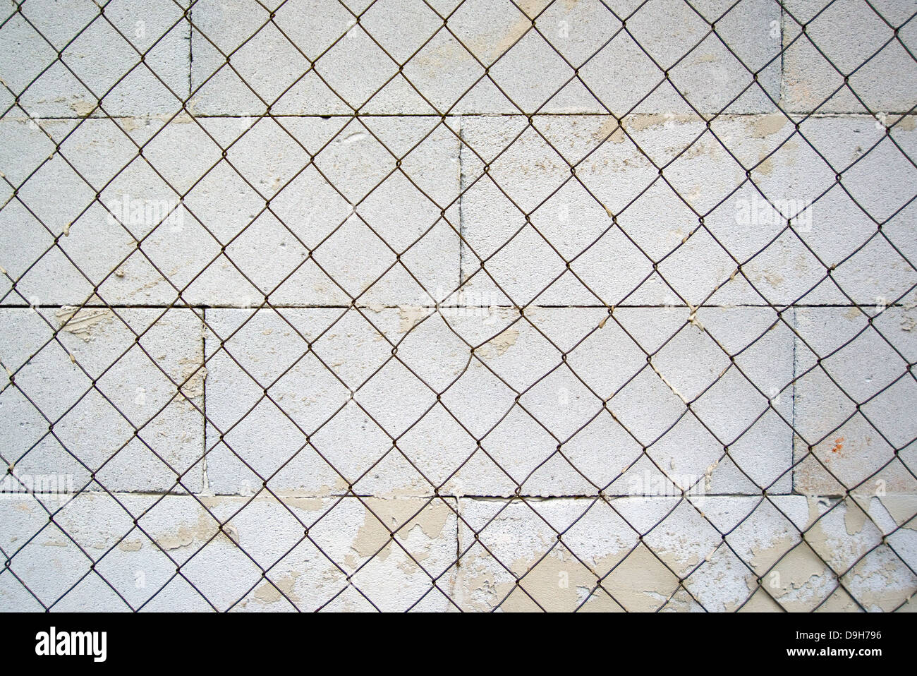 Metal grid fence, urban scenery background Stock Photo - Alamy