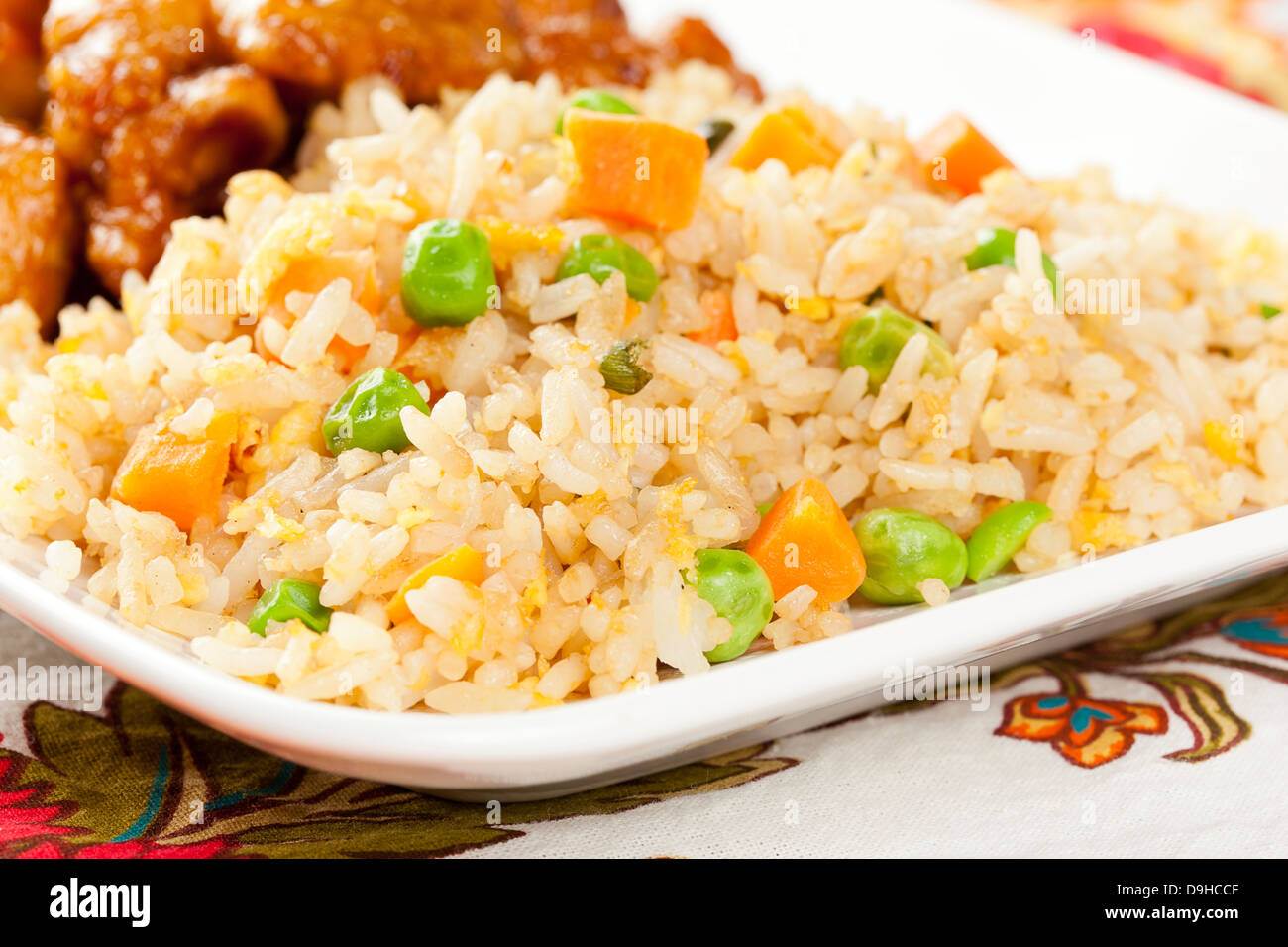 Homemade Fried Rice with peas and carrots Stock Photo