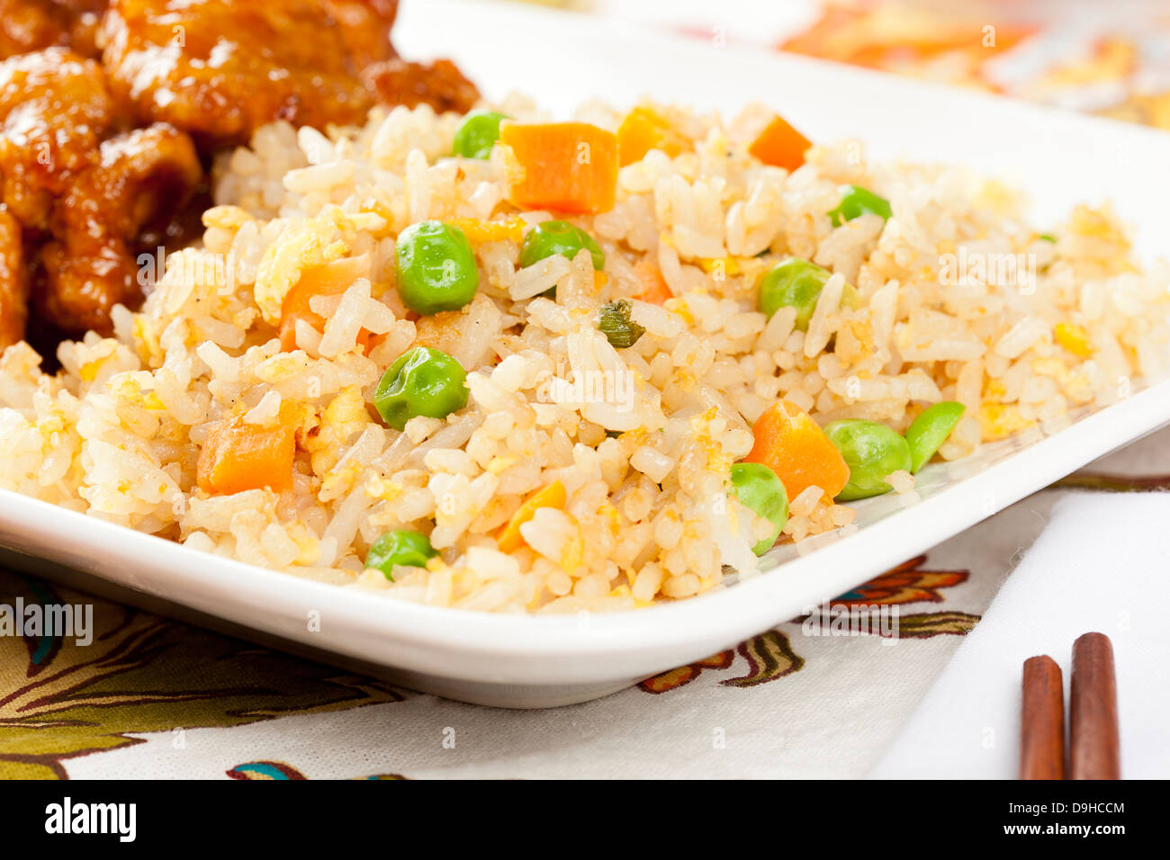 Homemade Fried Rice with peas and carrots Stock Photo