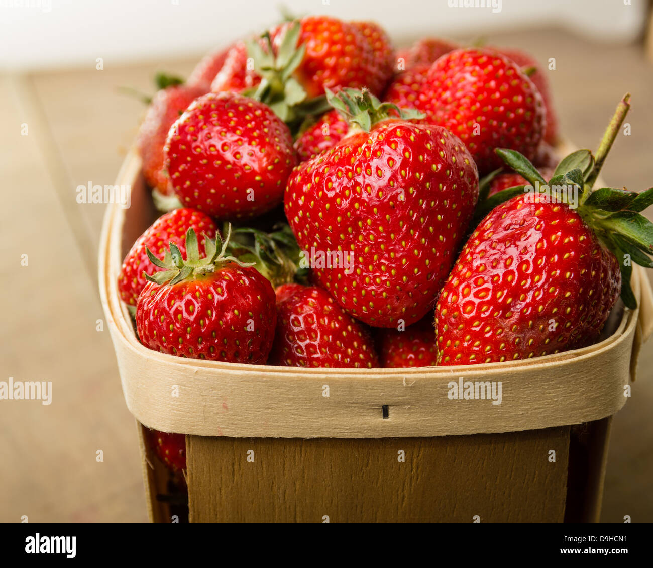 Freshly picked organic strawberries in a basket Stock Photo - Alamy