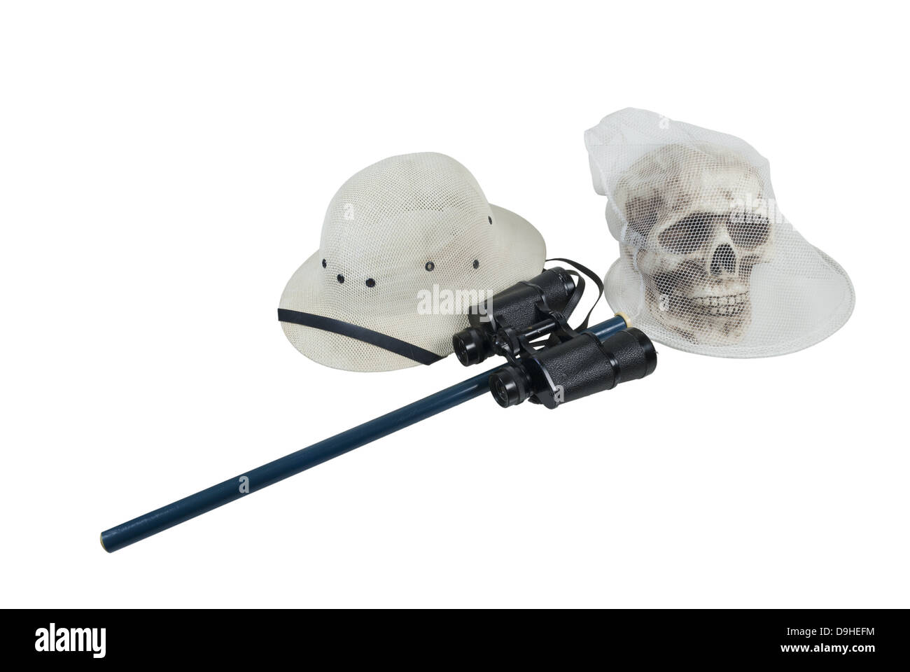 Zombie hunting with Pith Helmet Binoculars and net on a skull - path included Stock Photo