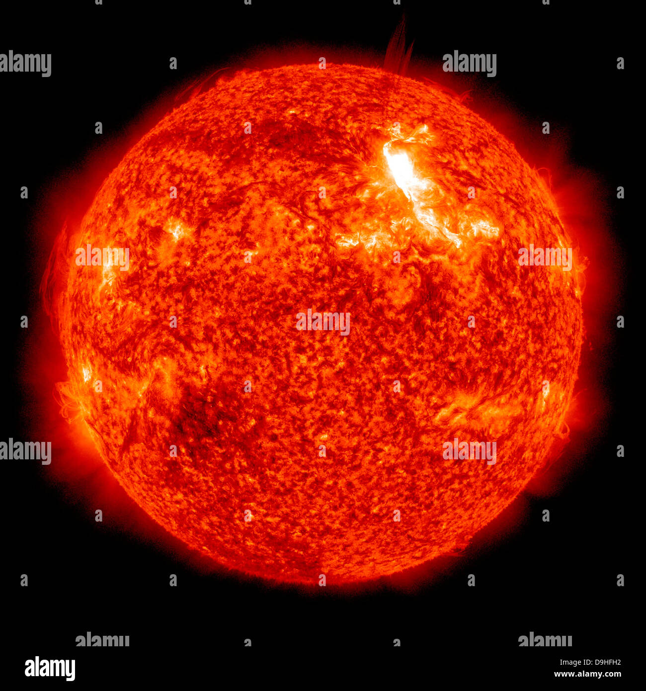 An intensity M8.7 solar flare on the Sun's surface. Stock Photo