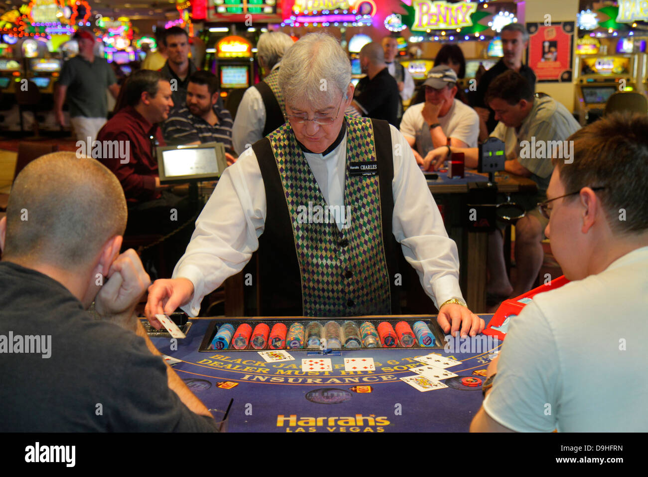 Las Vegas Nevada,The Strip,South Las Vegas Boulevard,Harrah's Las Vegas,hotel,casino,gambler,gamble,gambling,dealer,Blackjack,employee worker workers Stock Photo