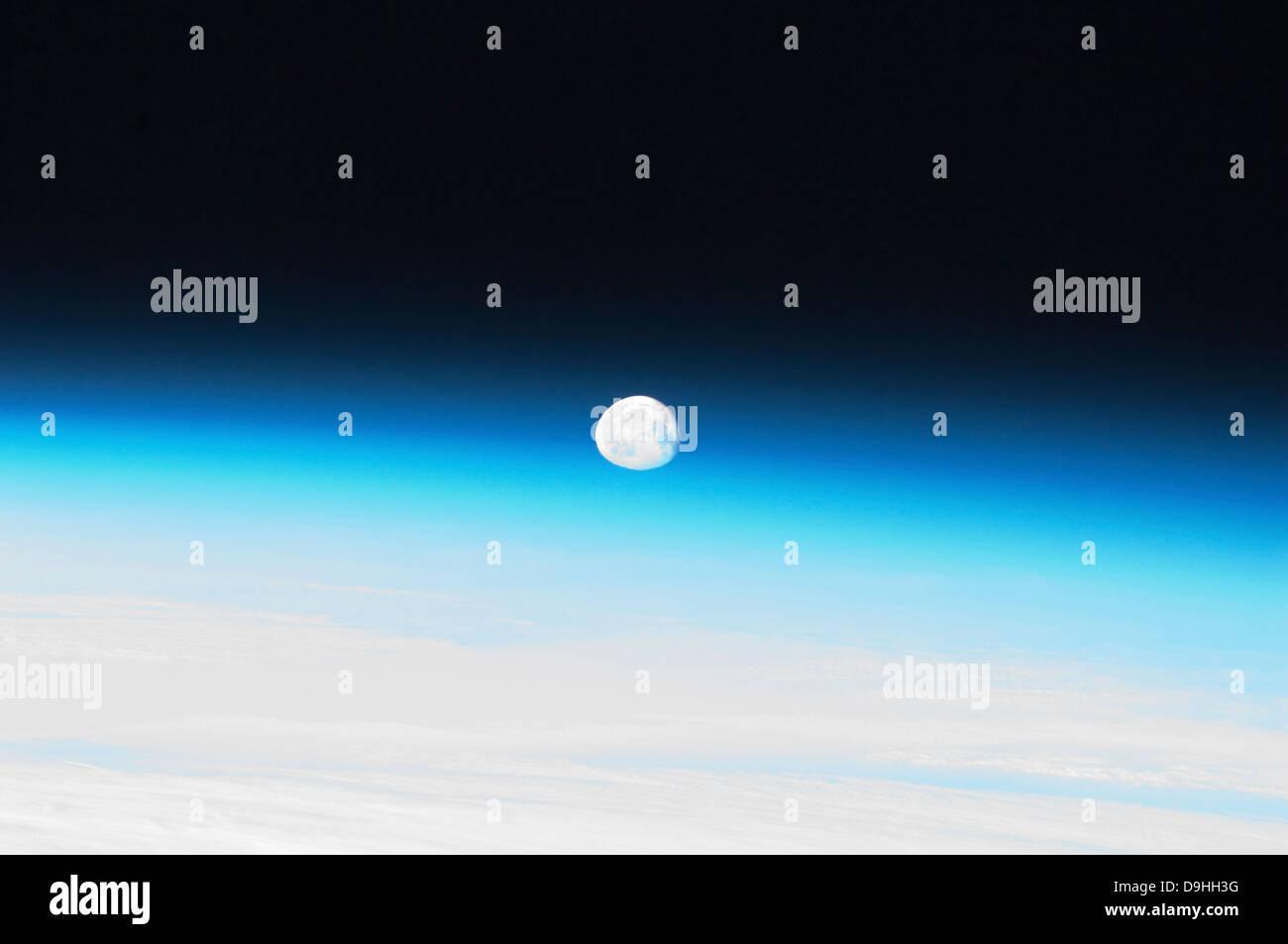The moon and Earth's atmosphere. Stock Photo