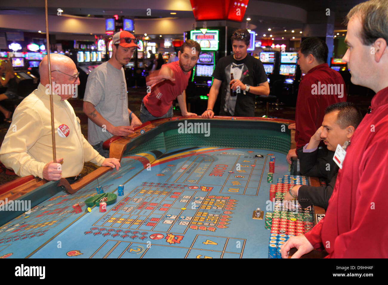 Las Vegas Nevada,Downtown,Plaza Hotel & Casino,gamble,gambling,gamblers,craps,dice,tossing,throwing,adult adults man men male,stickman,base dealer,box Stock Photo