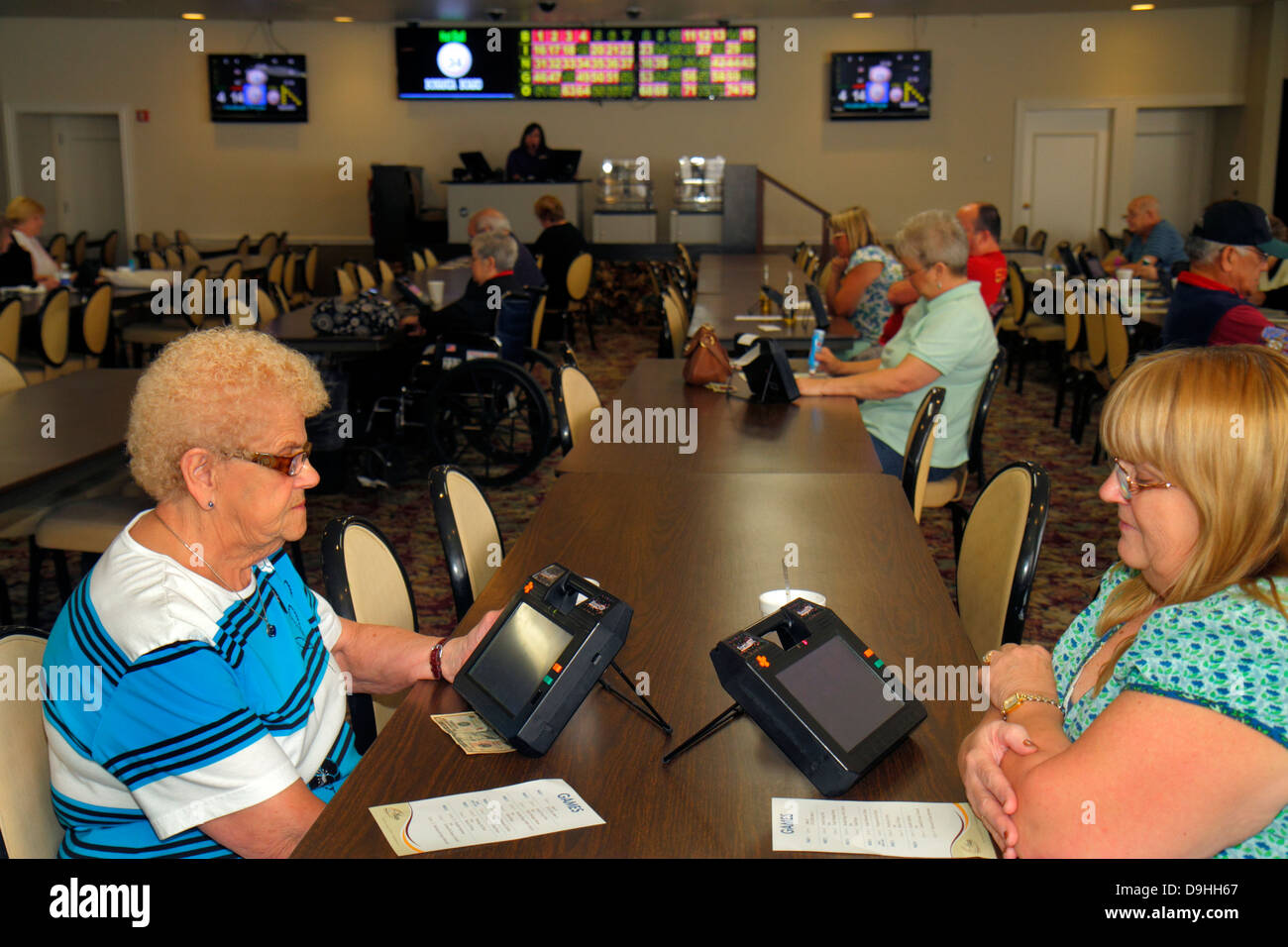 Las Vegas Nevada,Downtown,Plaza Hotel & Casino,bingo,gamble,gambling,gamblers,game,luck,woman female women,senior seniors citizen citizens,electronic, Stock Photo