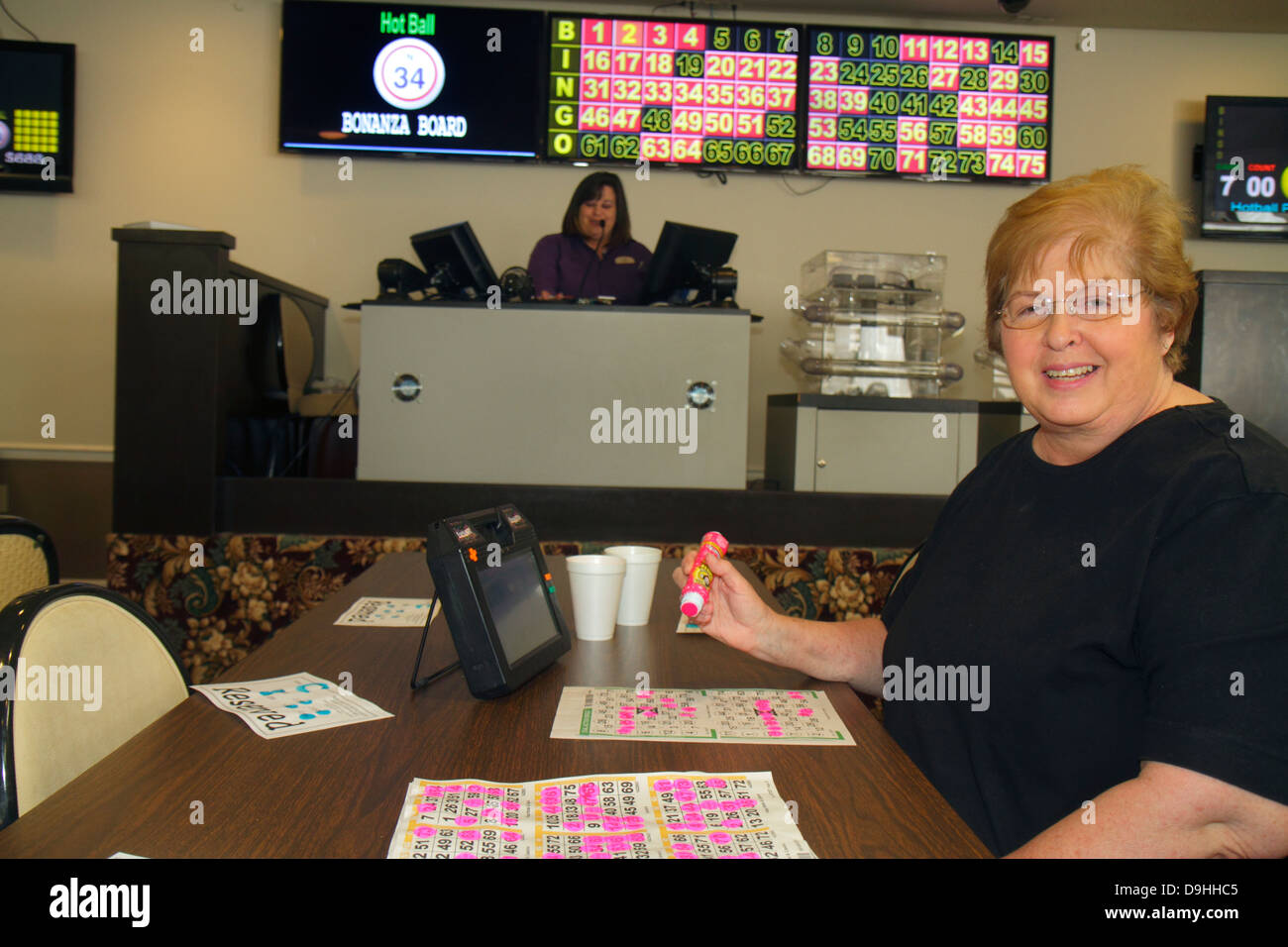 Las Vegas Nevada,Freemont Street,Plaza Hotel & Casino,bingo,gamble,gambling,gamblers,game,luck,woman female women,electronic,card,player,NV130329037 Stock Photo