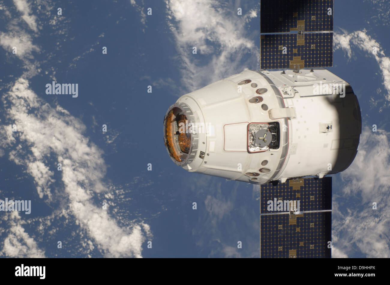 May 25, 2012 - The SpaceX Dragon commercial cargo craft approaches the International Space Station for grapple and berthing. Stock Photo