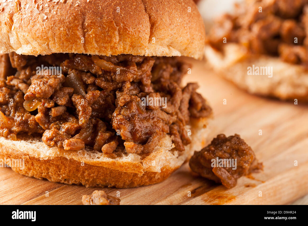 Sloppy Barbecue Beef Sandwich on a whole wheat bun Stock Photo
