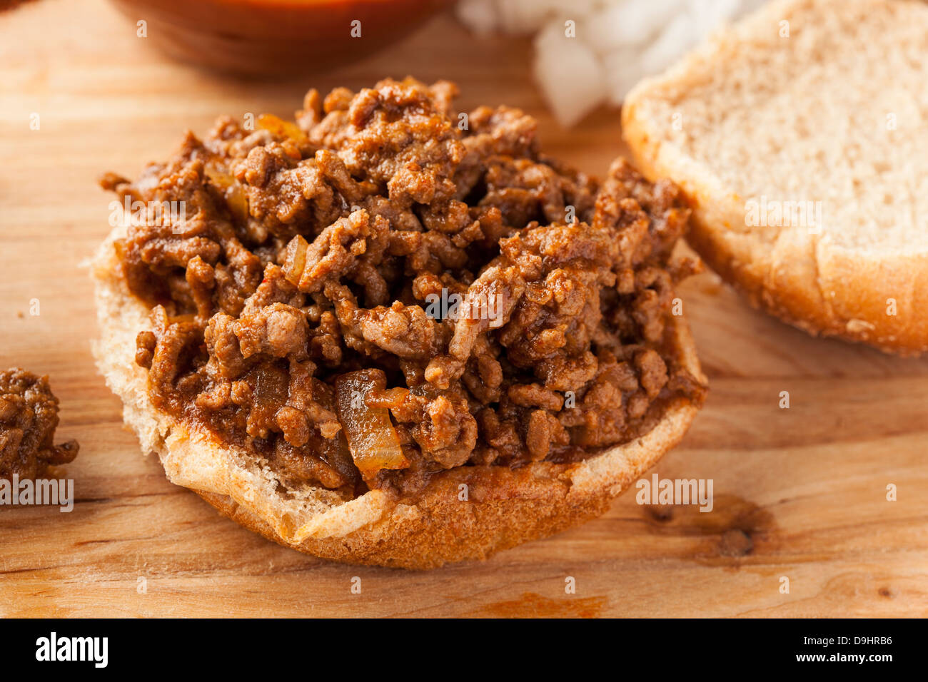 Sloppy Barbecue Beef Sandwich on a whole wheat bun Stock Photo