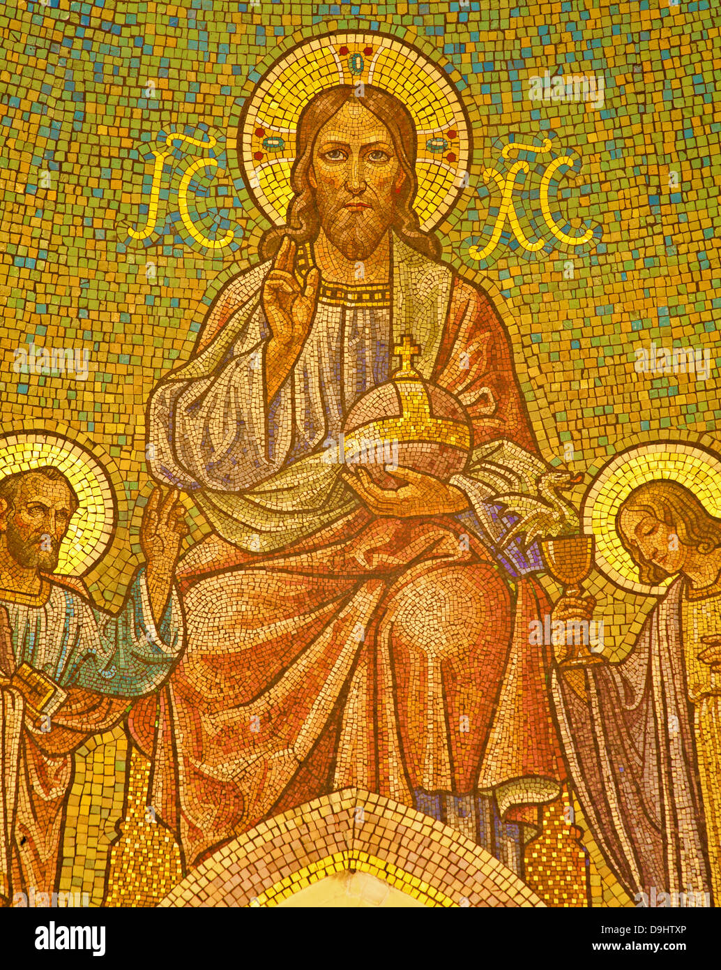 MADRID - MARCH 9: Mosaic of Jesus Christ and apostle Peter and John from main apse of Iglesia de San Manuel Stock Photo