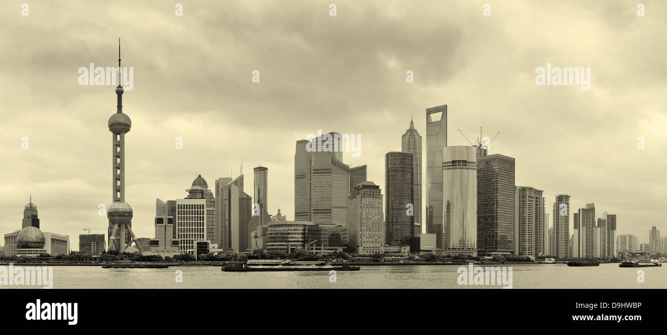 Shanghai skyline over river in overcast day in black and white Stock Photo