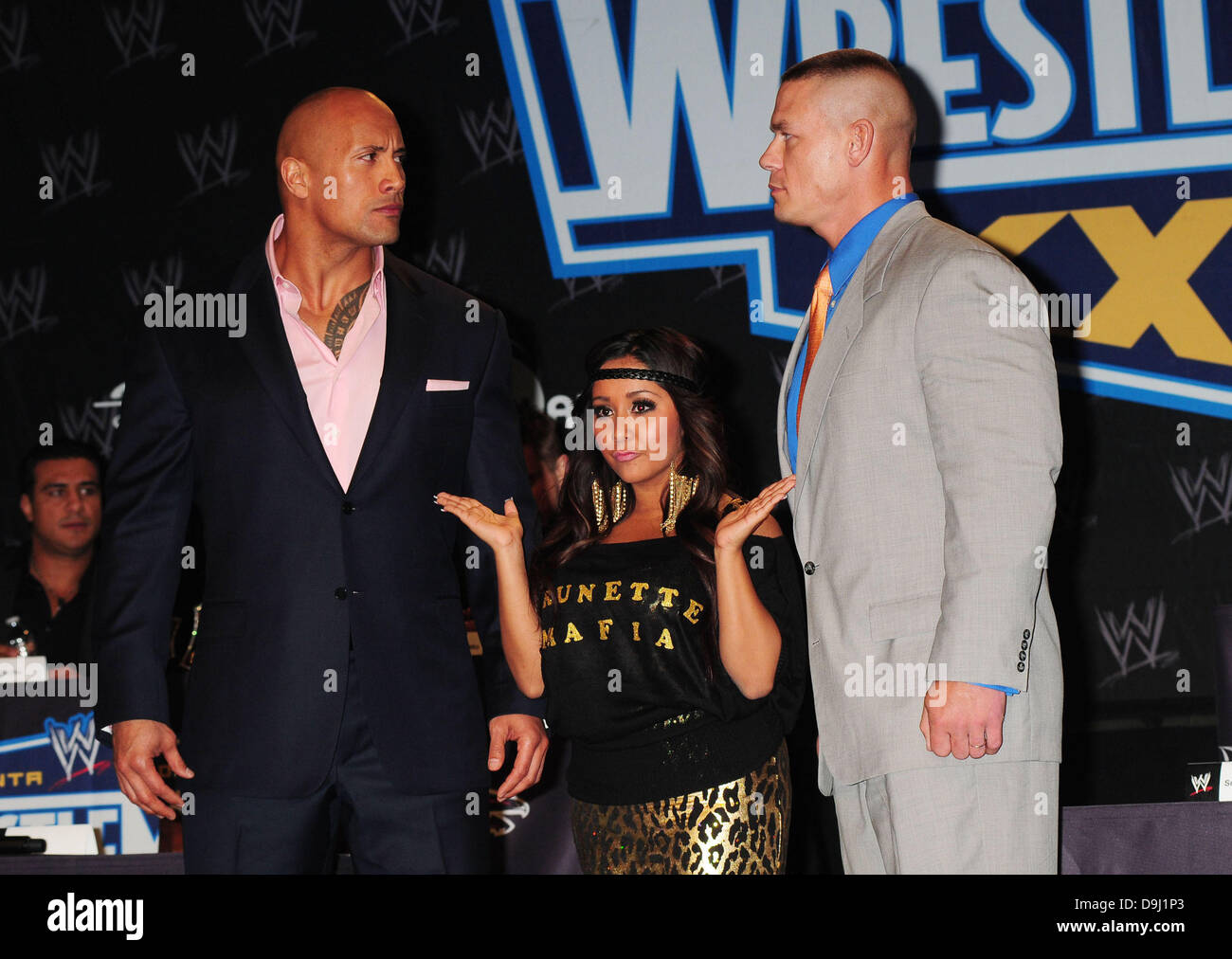 Dwayne The Rock Johnson, John Cena in attendance for WRESTLEMANIA XXVII  Press Conference, Hard Rock Cafe, New York, NY March 30, 2011. Photo By:  Rob Rich/Everett Collection Stock Photo - Alamy