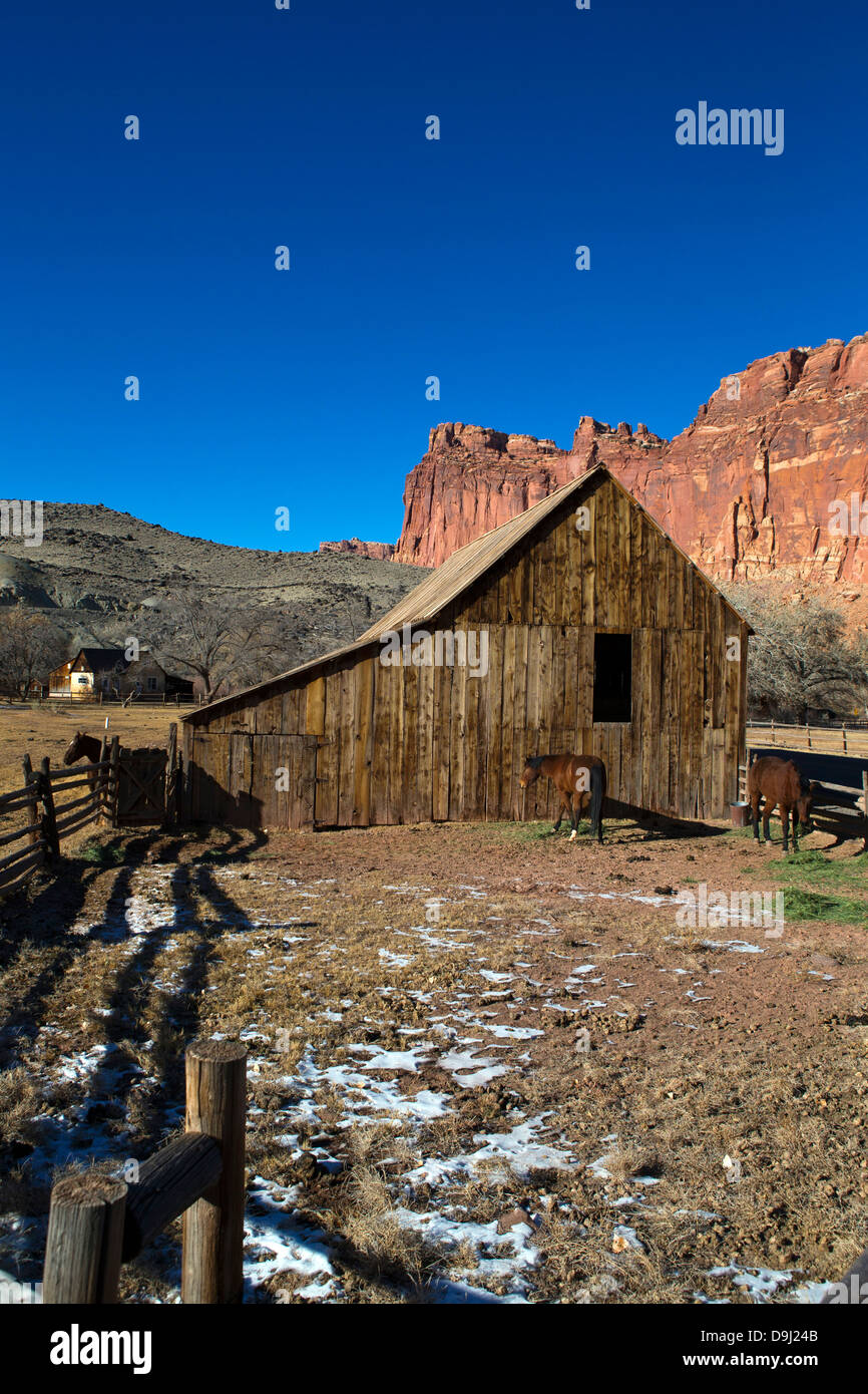 Horse stable and corral with sandstone rock formations in the background, Historic Fruita, Capitol Reef National Park, Utah, United States of America Stock Photo