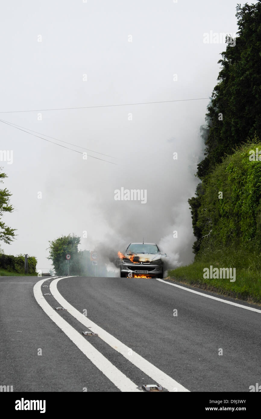 Aberystwyth, Wales, UK. 20th June, 2013. A dramatic car fire at the top