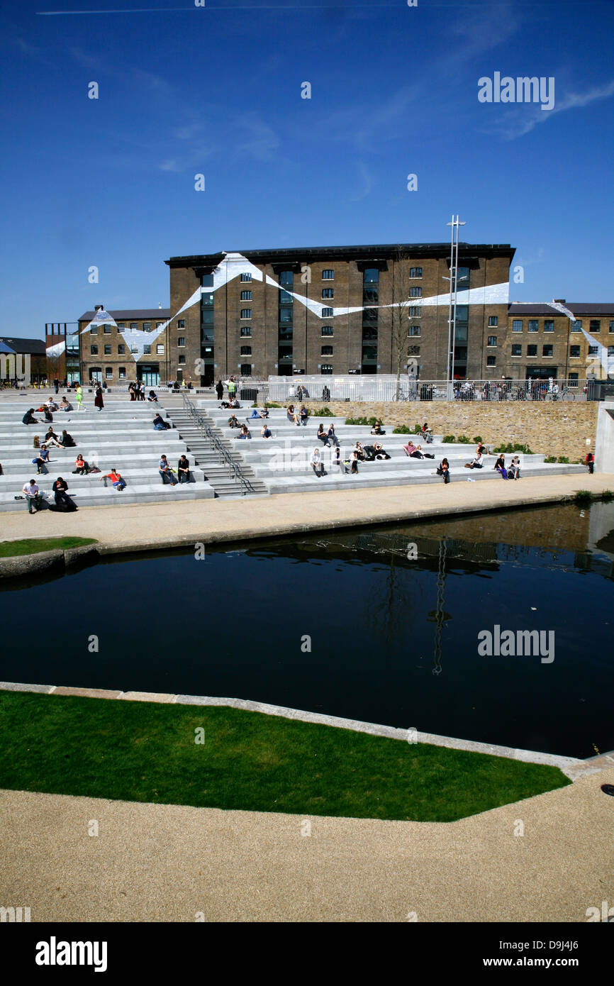 View across the Regent's Canal to the Granary Building on Granary Square, King's Cross, London, UK Stock Photo