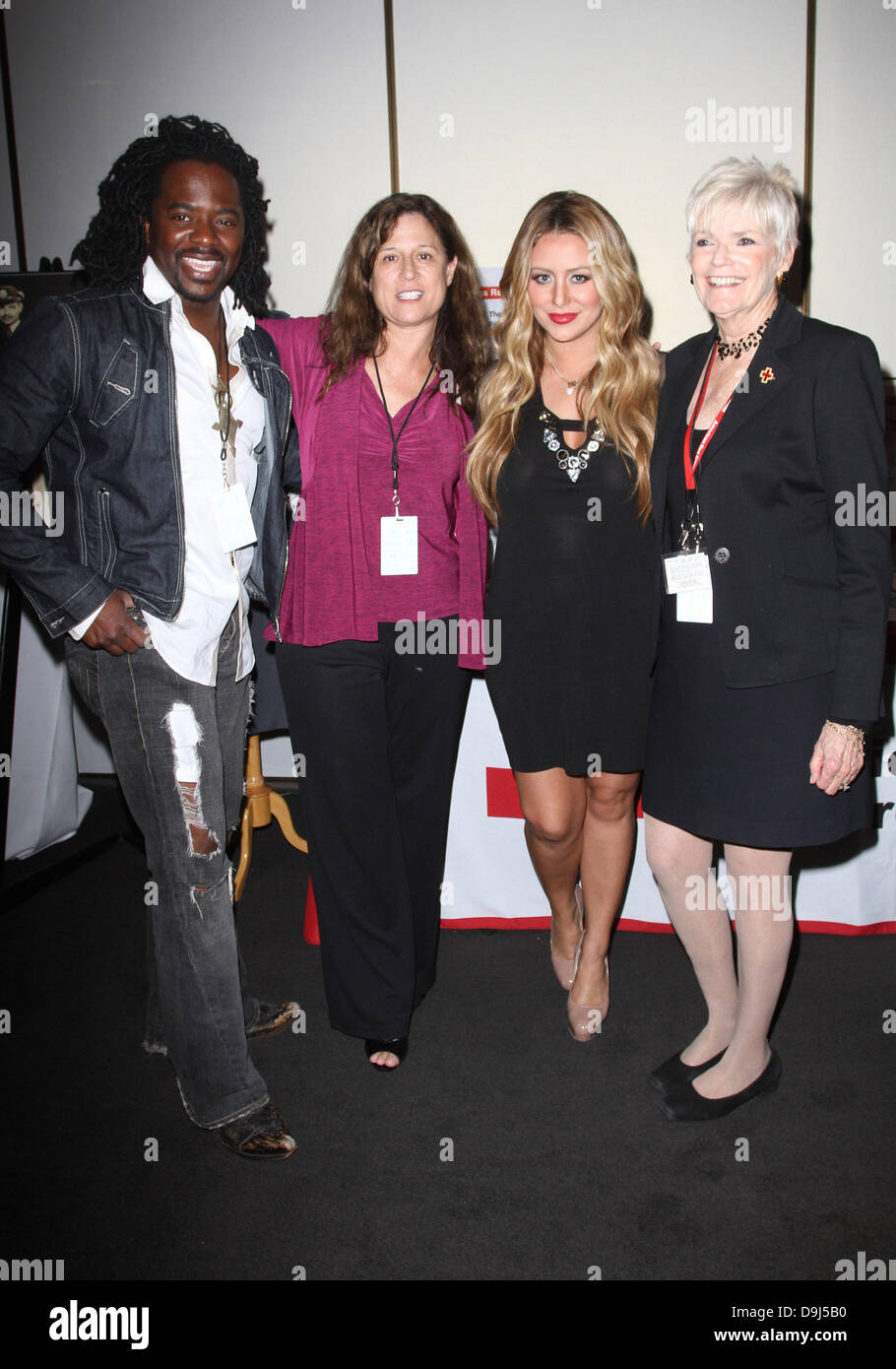 Aubrey O'Day with American Red Cross Staff 2011 GBK Kids' Choice Awards Gifting Lounge held at THE SLS Hotel Los Angeles, California - 31.03.11 Stock Photo