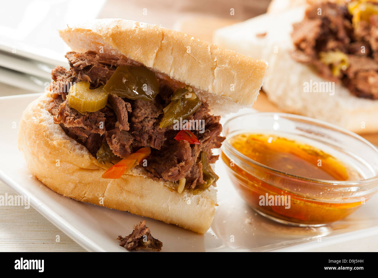 Juicy Homemade Italian Beef Sandwich with hot peppers Stock Photo Alamy