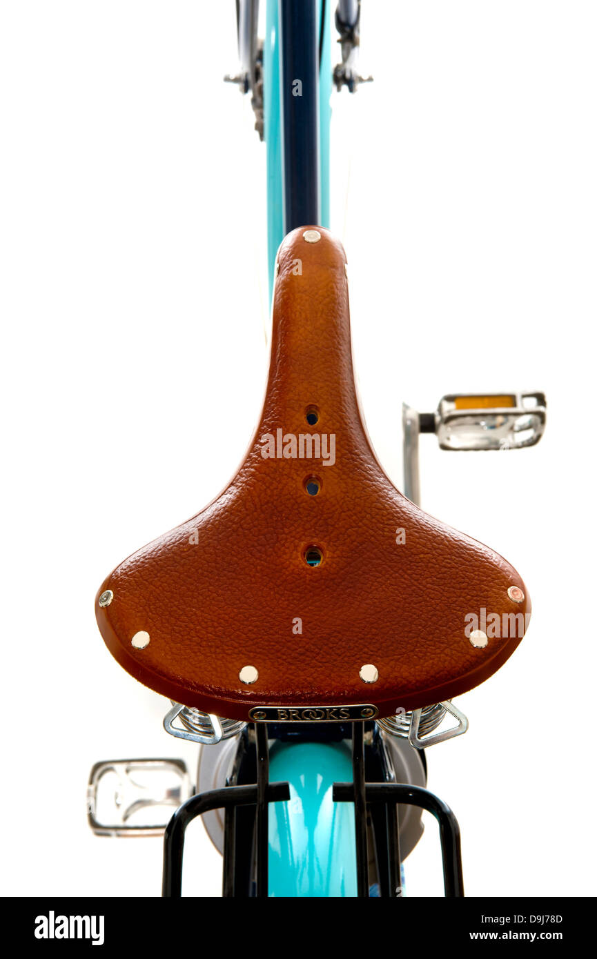 Brown leather bike seat shot on a white background. Stock Photo