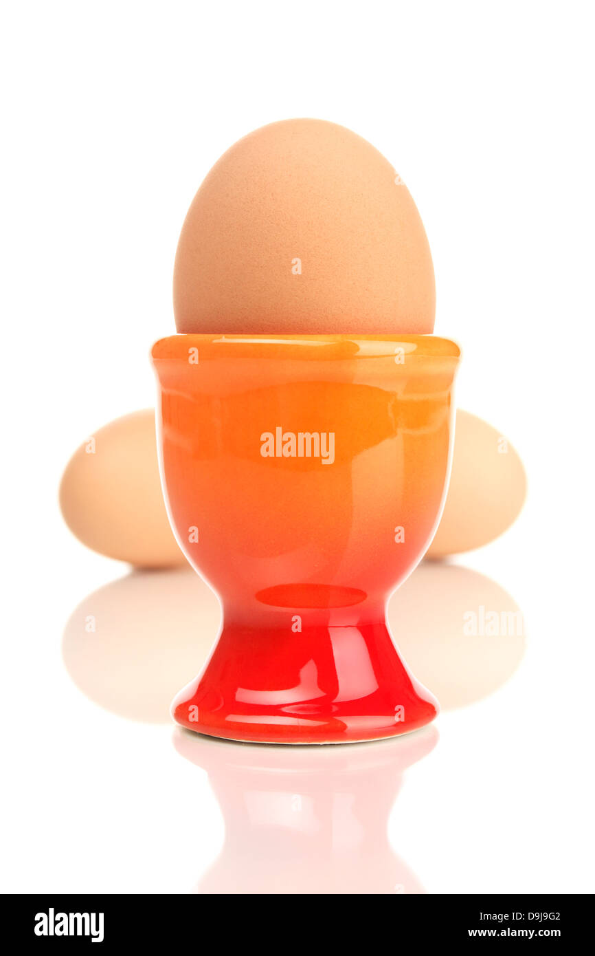 Cooked egg in the eggcup, Boiled harrow in harrow cup Stock Photo
