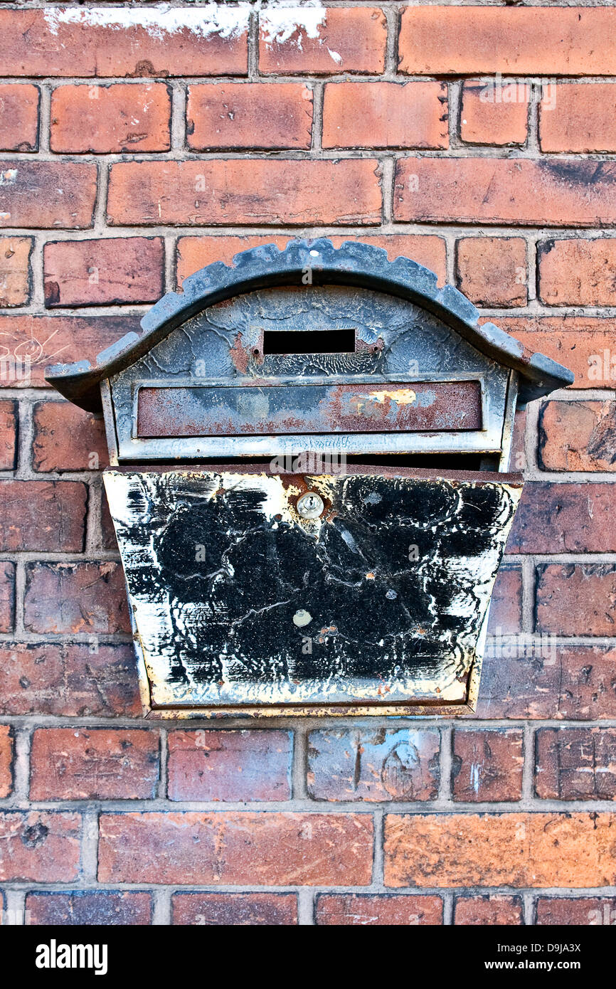 Old mailbox flow on a house wall, Old mail box on a house, Stock Photo