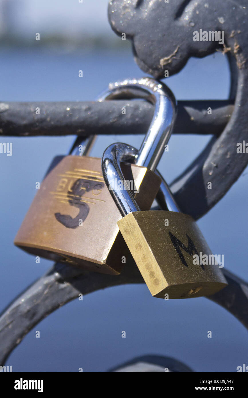 Padlocks in a bridge in the Alster Padlocks on a bridge At the Alster
