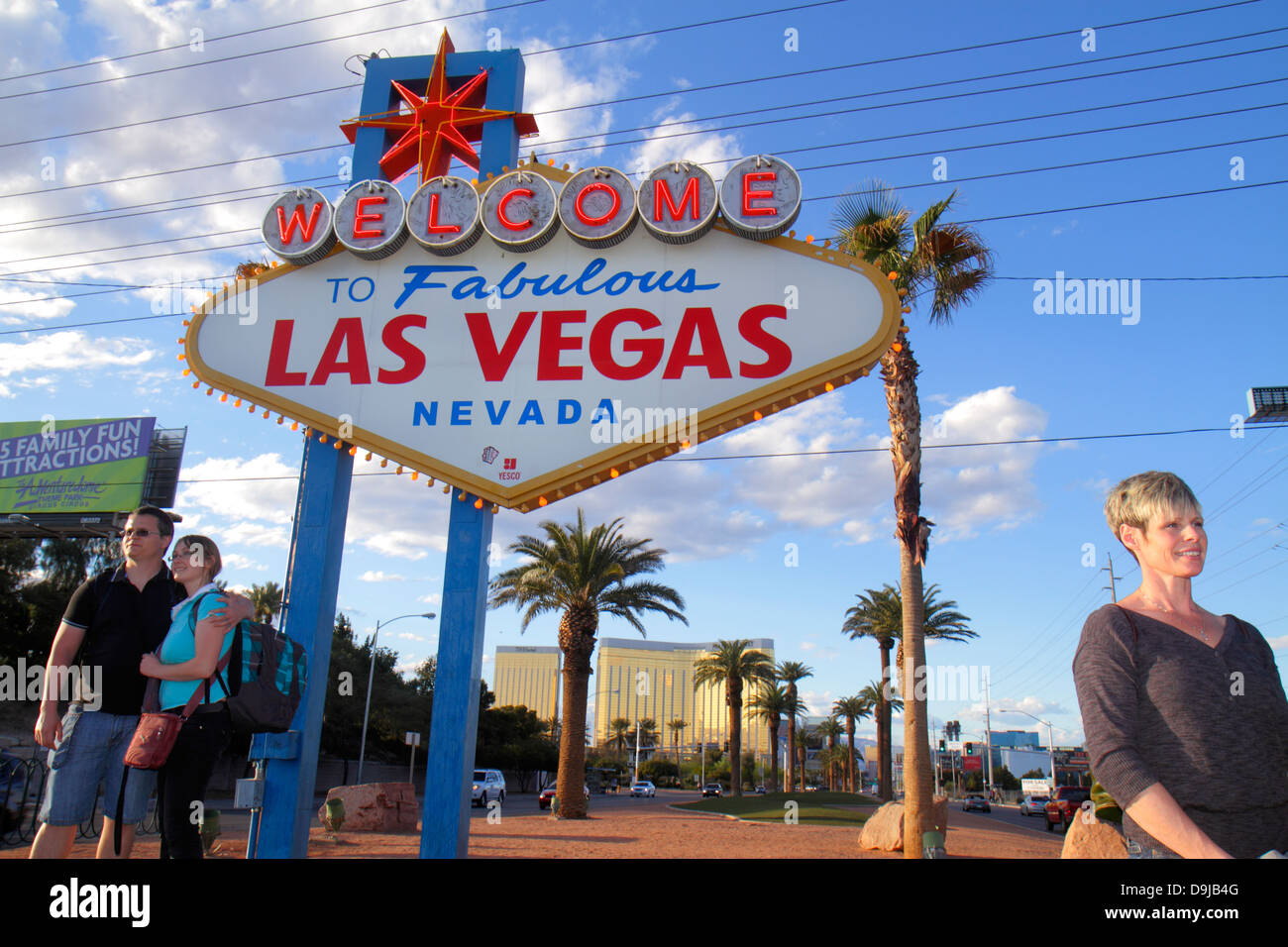 Las Vegas Nevada,South Las Vegas Boulevard,The Strip,Welcome to Fabulous Las Vegas sign historic,posing,pose,camera,digital,taking adult adults man me Stock Photo