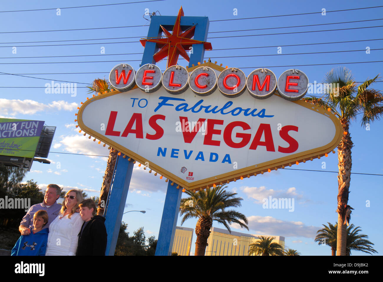 Las Vegas Nevada,South Las Vegas Boulevard,The Strip,Welcome to Fabulous Las Vegas sign historic,posing,pose,camera,digital,taking adult adults man me Stock Photo