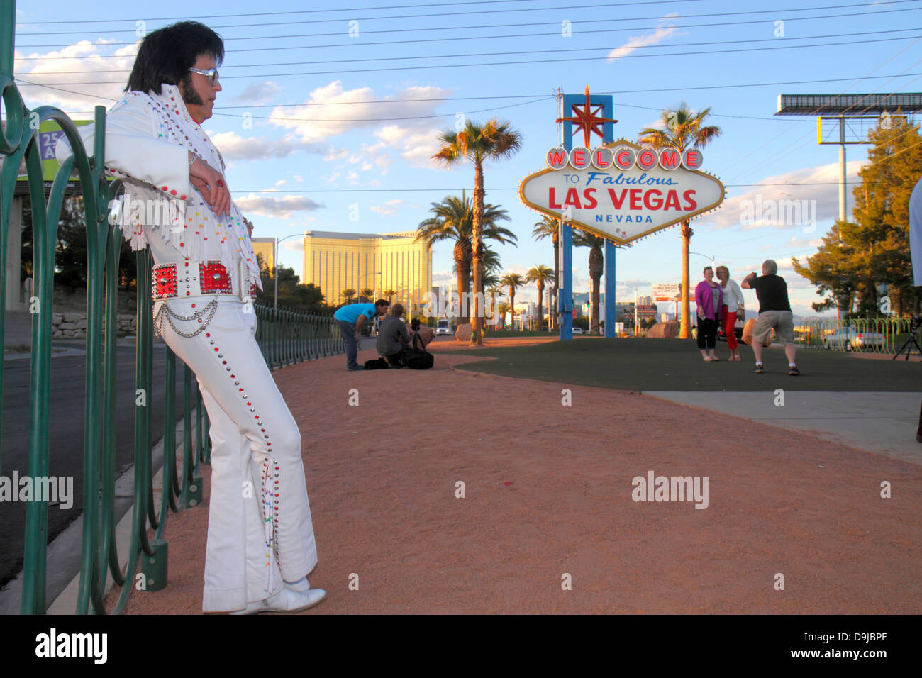 Las Vegas Nevada,South Las Vegas Boulevard,The Strip,Welcome to Fabulous Las Vegas sign historic,adult adults man men male,Elvis Presley impersonator, Stock Photo