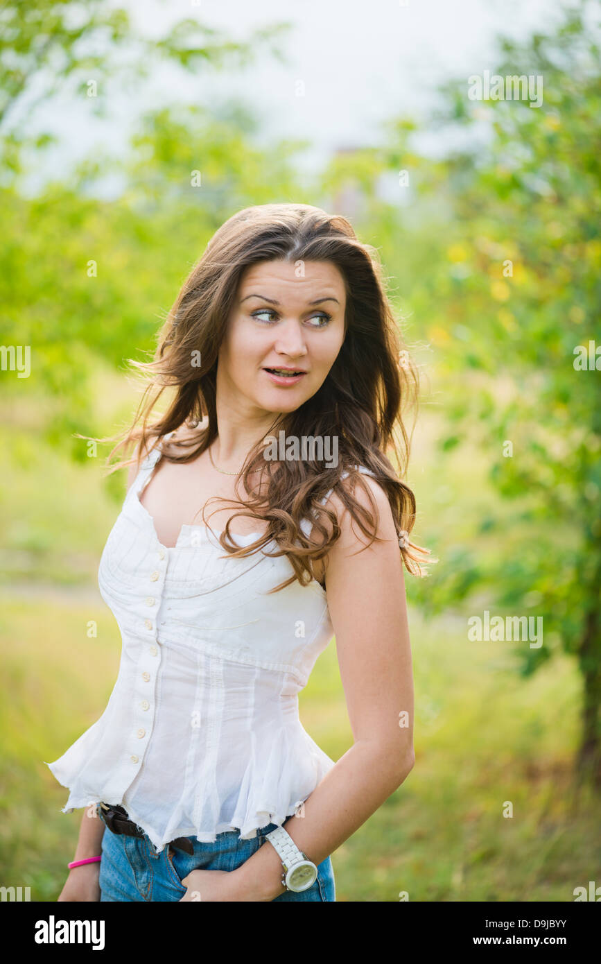 portrait of a surprised young woman Stock Photo - Alamy