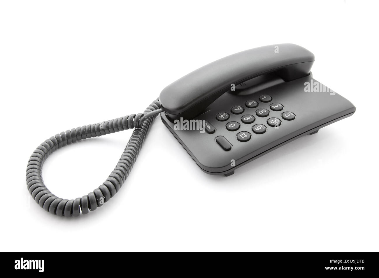 Black office telephone with soft shadow on white Stock Photo