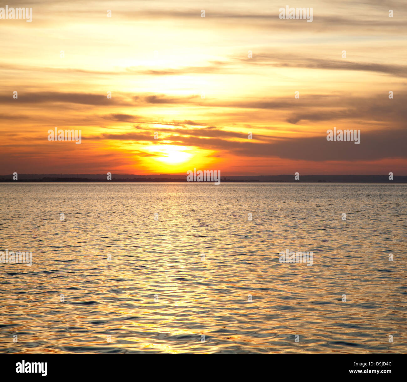 Sunset at the sea Stock Photo - Alamy