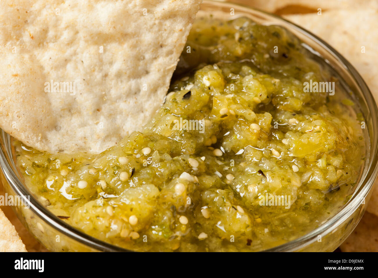 Fresh Homemade Salsa Verde with tortilla chips Stock Photo