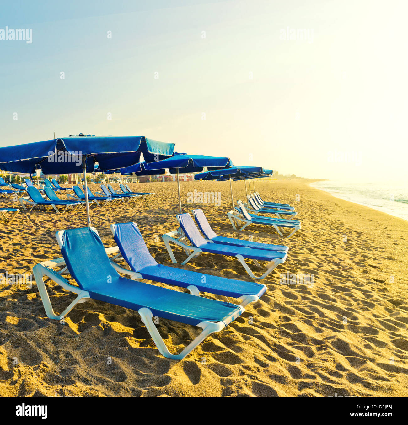 Chaiselongues on the beach Stock Photo Alamy
