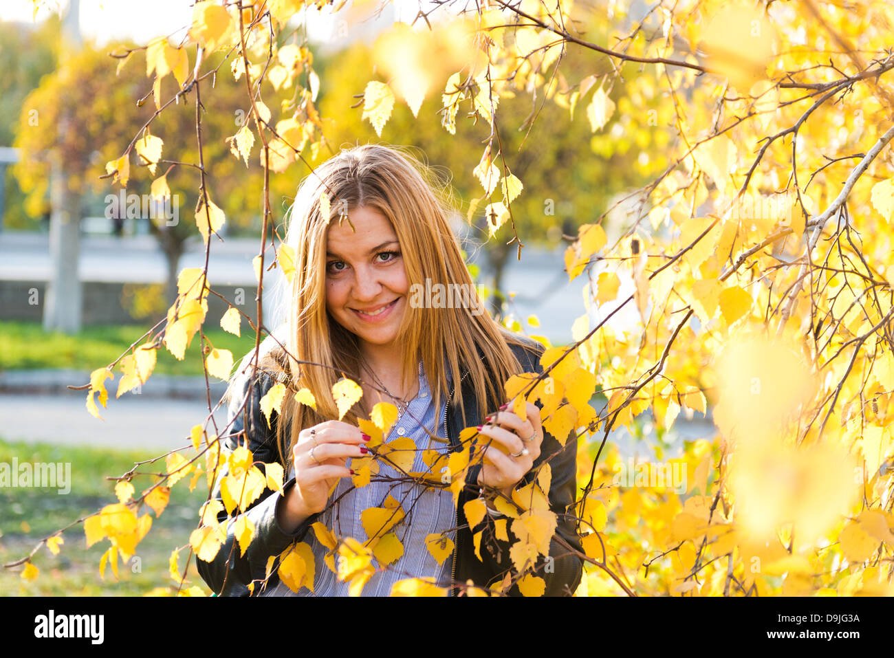 close up portrait of autumn woman with yellow leaves Stock Photo - Alamy