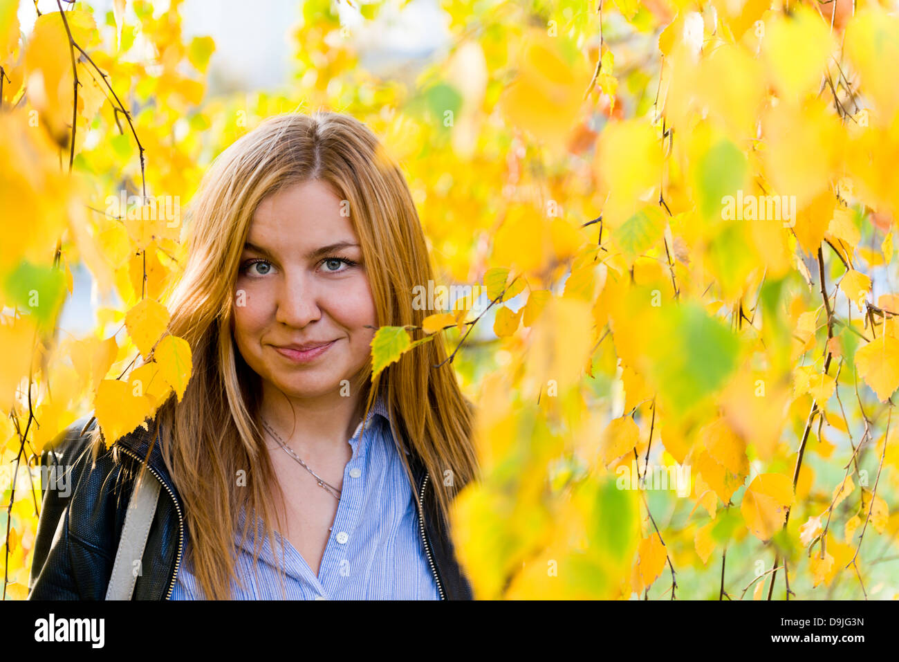 close up portrait of autumn woman with yellow leaves Stock Photo - Alamy