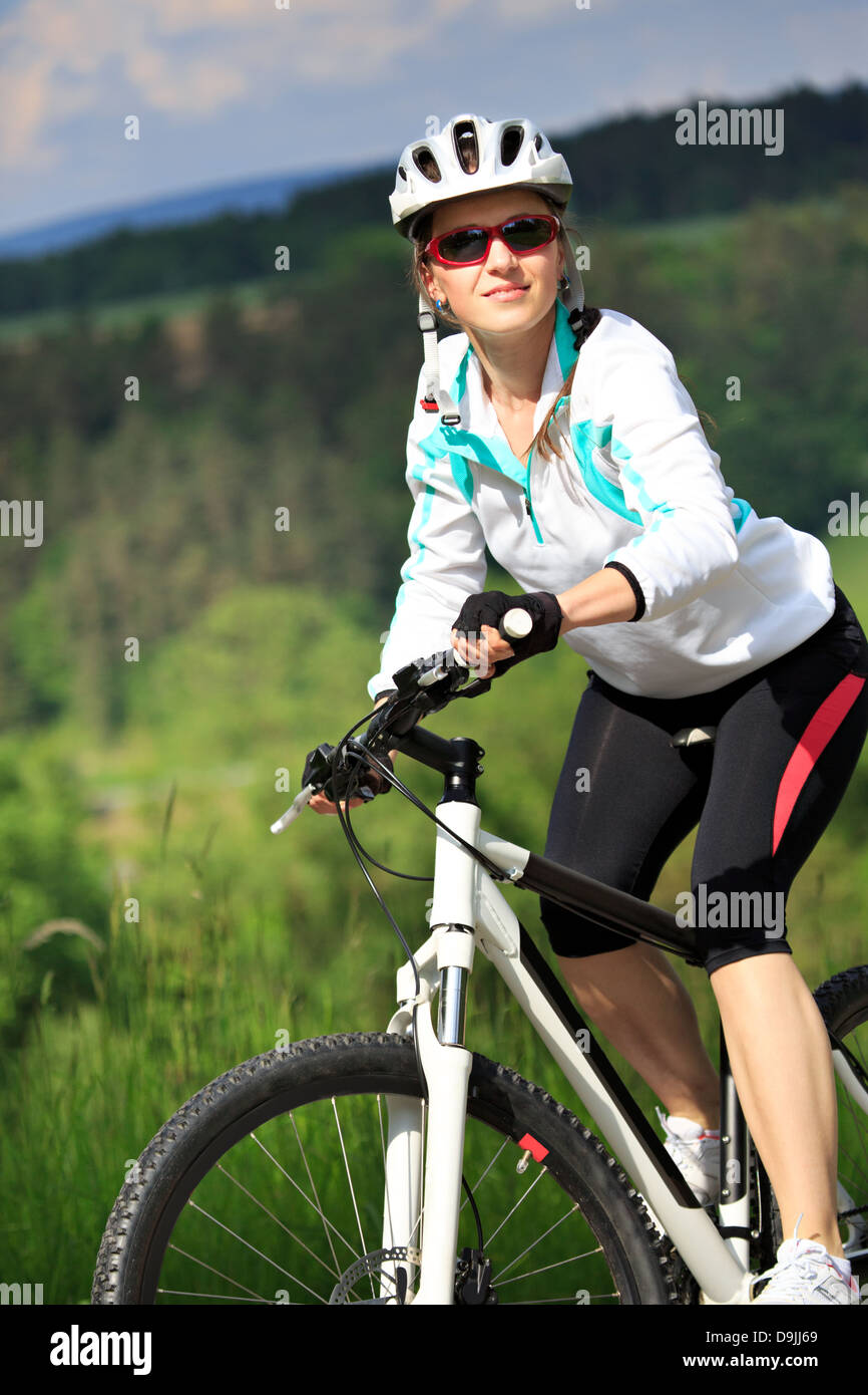 Woman bike in front hi res stock photography and images Alamy Woman bike in front hi res stock photography and images Alamy