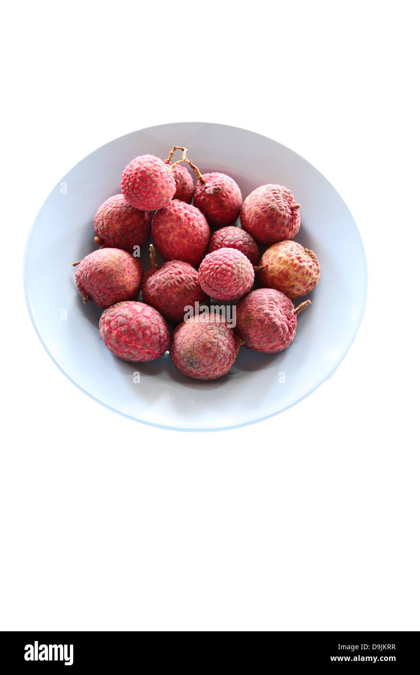 Litchi or lychee in the dish on white background and Litchi or lychee is a domestic fruit in Thailand. Stock Photo